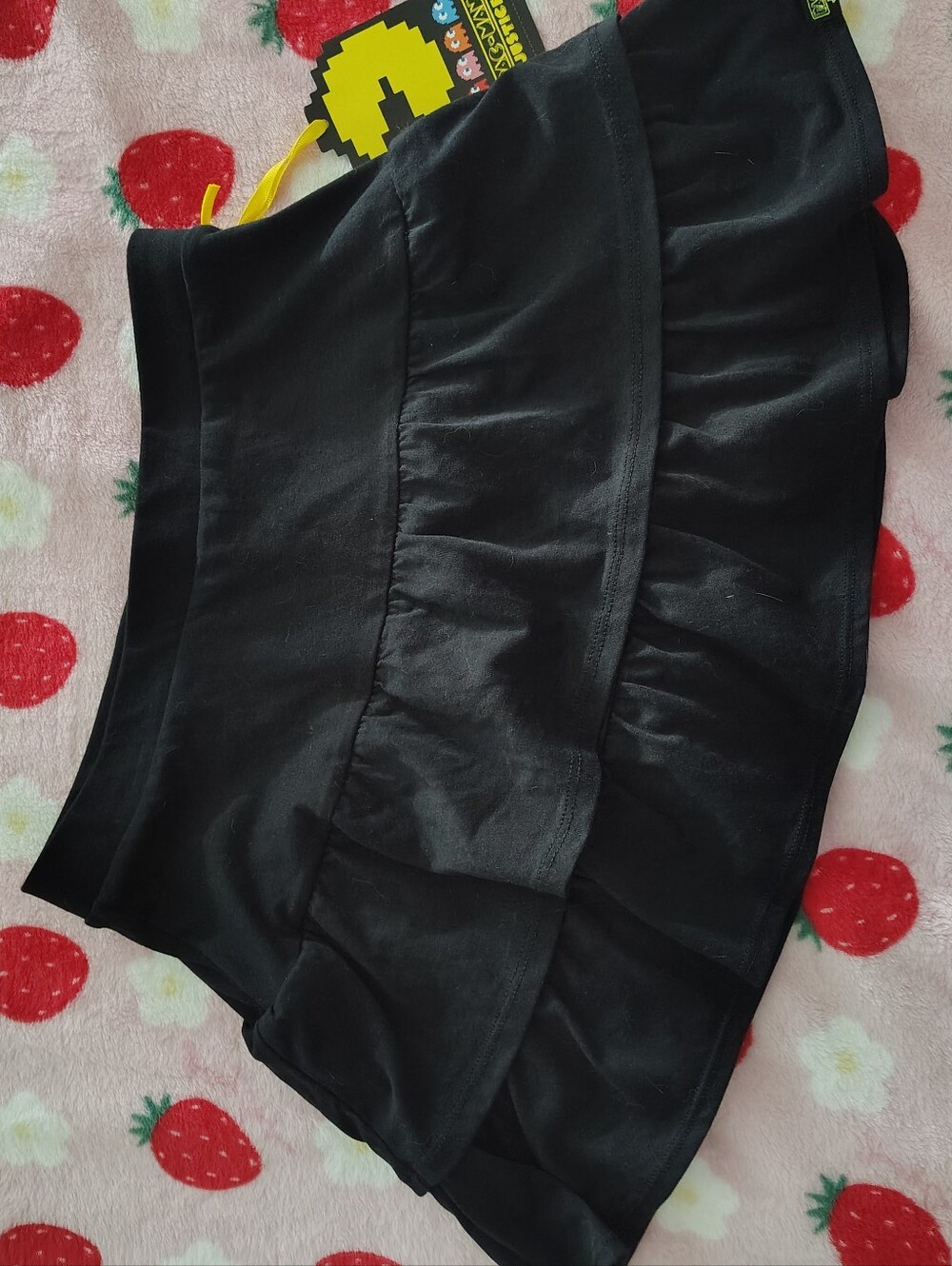 black ruffled mini skirt